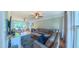 Open living room area filled with natural light and an inviting seating area and fireplace at 8042 Hogan Dr, Wake Forest, NC 27587