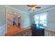 Comfortable home office with traditional furnishings, natural light, and hardwood floors offering a productive workspace at 8042 Hogan Dr, Wake Forest, NC 27587