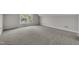 Bedroom featuring a window letting in light, plush carpet, and neutral colored walls at 805 Alden Bridge Dr, Cary, NC 27519