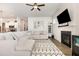 Spacious living room seamlessly flows into the kitchen, perfect for entertaining and Gathering gatherings at 816 Trumpet Vine Ct, Wendell, NC 27591