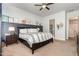 Comfortable main bedroom featuring neutral colors, and a ceiling fan at 816 Trumpet Vine Ct, Wendell, NC 27591