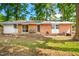 Exterior view of backyard and patio with sliding glass door at 903 W Maynard Ave, Durham, NC 27704