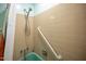 Retro style bathroom featuring a mint green bathtub with grab bar and vintage tile work at 903 W Maynard Ave, Durham, NC 27704