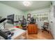 Bright office with hardwood floors and natural light from the window at 903 W Maynard Ave, Durham, NC 27704