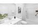 Well-lit bathroom with a modern vanity and a shower-tub combination at 94 Mable Court # 16, Lillington, NC 27546