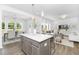 Open-concept kitchen seamlessly connects to the dining and living areas for easy entertaining at 94 Mable Court # 16, Lillington, NC 27546