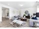 Comfortable living room featuring contemporary decor, neutral colors, and an open layout at 94 Mable Court # 16, Lillington, NC 27546