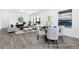 Well-lit living space with dining area and comfortable seating arrangement at 94 Mable Court # 16, Lillington, NC 27546