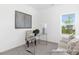 Bright home office space with modern decor, light gray walls, and a window view at 94 Mable Court # 16, Lillington, NC 27546
