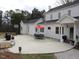 Spacious patio with an outdoor dining set and basketball hoop, perfect for entertaining at 100 Lager Ln, Garner, NC 27529