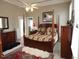 Comfortable bedroom featuring four-poster bed and stylish decor at 100 Lager Ln, Garner, NC 27529