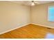 Bedroom with wood floors and natural light at 1005 Driftwood Dr, Siler City, NC 27344