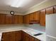 Kitchen with countertops and wood cabinets at 1005 Driftwood Dr, Siler City, NC 27344