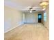 Open living room with neutral walls, carpeted floors, and natural light at 1005 Driftwood Dr, Siler City, NC 27344