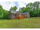 Expansive backyard with a large wooden deck, perfect for outdoor entertaining and relaxation at 1016 Luminary Ln, Willow Springs, NC 27592