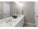Elegant bathroom featuring double sinks, spacious countertops, and neutral color scheme at 1016 Luminary Ln, Willow Springs, NC 27592
