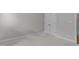 A large bedroom featuring carpeted floors and neutral paint at 1016 Luminary Ln, Willow Springs, NC 27592
