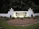 Elegant entrance to the Landingham community, featuring a beautifully landscaped sign at 1016 Luminary Ln, Willow Springs, NC 27592