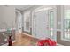 Inviting foyer with hardwood floors, a decorative front door, and elegant trim at 1016 Luminary Ln, Willow Springs, NC 27592
