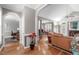 Spacious living room with hardwood floors and open archways at 1016 Luminary Ln, Willow Springs, NC 27592