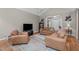 Comfortable living room with vaulted ceiling and neutral tones at 1016 Luminary Ln, Willow Springs, NC 27592