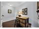 Bright entryway featuring hardwood floors, charming decor, and easy access to the main living areas at 10520 Sablewood Dr # 103, Raleigh, NC 27617