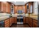 Well-equipped kitchen featuring granite countertops, stainless steel appliances, and ample cabinet space at 10520 Sablewood Dr # 103, Raleigh, NC 27617