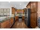 Well-equipped kitchen with stainless steel appliances, granite counters, and ample cabinet space at 10520 Sablewood Dr # 103, Raleigh, NC 27617