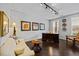 Cozy living room with comfortable seating, natural light, and stylish decor at 10520 Sablewood Dr # 103, Raleigh, NC 27617