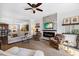 Spacious living room featuring a fireplace, comfortable seating and dining space at 10520 Sablewood Dr # 103, Raleigh, NC 27617