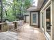 Exterior deck offers a relaxing space with views of the trees and access to the backyard at 107 Long Shadow Ln, Cary, NC 27518