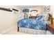 Well-lit bedroom with traditional decor and a view of the outdoors at 108 Hanover Pl, Chapel Hill, NC 27516