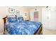 Comfortable bedroom with blue floral bedding and white built-in wardrobe at 108 Hanover Pl, Chapel Hill, NC 27516