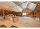 Spacious unfinished attic, ready for customization with exposed beams at 108 Hotelling Ct, Chapel Hill, NC 27514