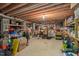 A spacious unfinished basement with exposed beams provides the opportunity for customization at 108 Hotelling Ct, Chapel Hill, NC 27514