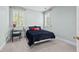 Comfortable bedroom featuring carpet and natural light at 108 Hotelling Ct, Chapel Hill, NC 27514