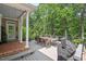 View of a spacious outdoor deck with ample seating, perfect for entertaining guests at 108 Hotelling Ct, Chapel Hill, NC 27514