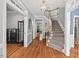 Welcoming foyer features hardwood floors, staircase, and access to multiple rooms at 108 Hotelling Ct, Chapel Hill, NC 27514