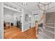 Welcoming foyer features hardwood floors, staircase, and access to multiple rooms at 108 Hotelling Ct, Chapel Hill, NC 27514