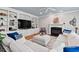 Bright living room featuring custom built-ins, a fireplace, and a comfortable seating area with plush cushions at 108 Hotelling Ct, Chapel Hill, NC 27514