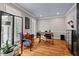Bright office featuring hardwood floors, large windows, and custom shelving at 108 Hotelling Ct, Chapel Hill, NC 27514
