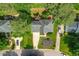 Aerial view of house with green landscaping and driveway at 110 Glenrose Ln, Cary, NC 27518