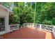A spacious and clean back deck with a white trellis at 110 Glenrose Ln, Cary, NC 27518