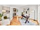 Office space with hardwood floors, french doors, and a view into the living room at 110 Glenrose Ln, Cary, NC 27518