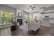 Bright and airy living room with fireplace, hardwood floors, and an open concept layout at 110 Huntersville Rd, Morrisville, NC 27560