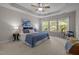 Spacious bedroom featuring tray ceilings, plush carpeting, large windows, and ample natural light at 110 Huntersville Rd, Morrisville, NC 27560