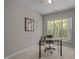 Home office space featuring a desk and a large window with natural light at 110 Huntersville Rd, Morrisville, NC 27560