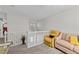 Spacious loft with comfortable seating, and an area for an office space or recreational room at 11013 Louson Pl, Raleigh, NC 27614