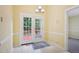Eat-in kitchen dining area features white trim, tile floors and outdoor access at 1102 Laurens Way, Knightdale, NC 27545