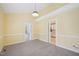 Bright dining room features neutral carpet, wainscoting and views to other rooms at 1102 Laurens Way, Knightdale, NC 27545